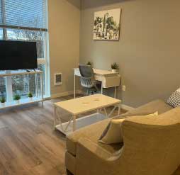 living area with couch and tv