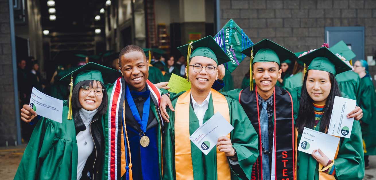 students in graduation robes and caps