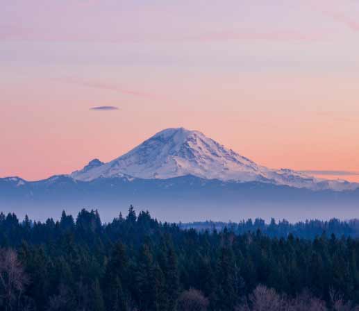 snowcapped mountain at sunset